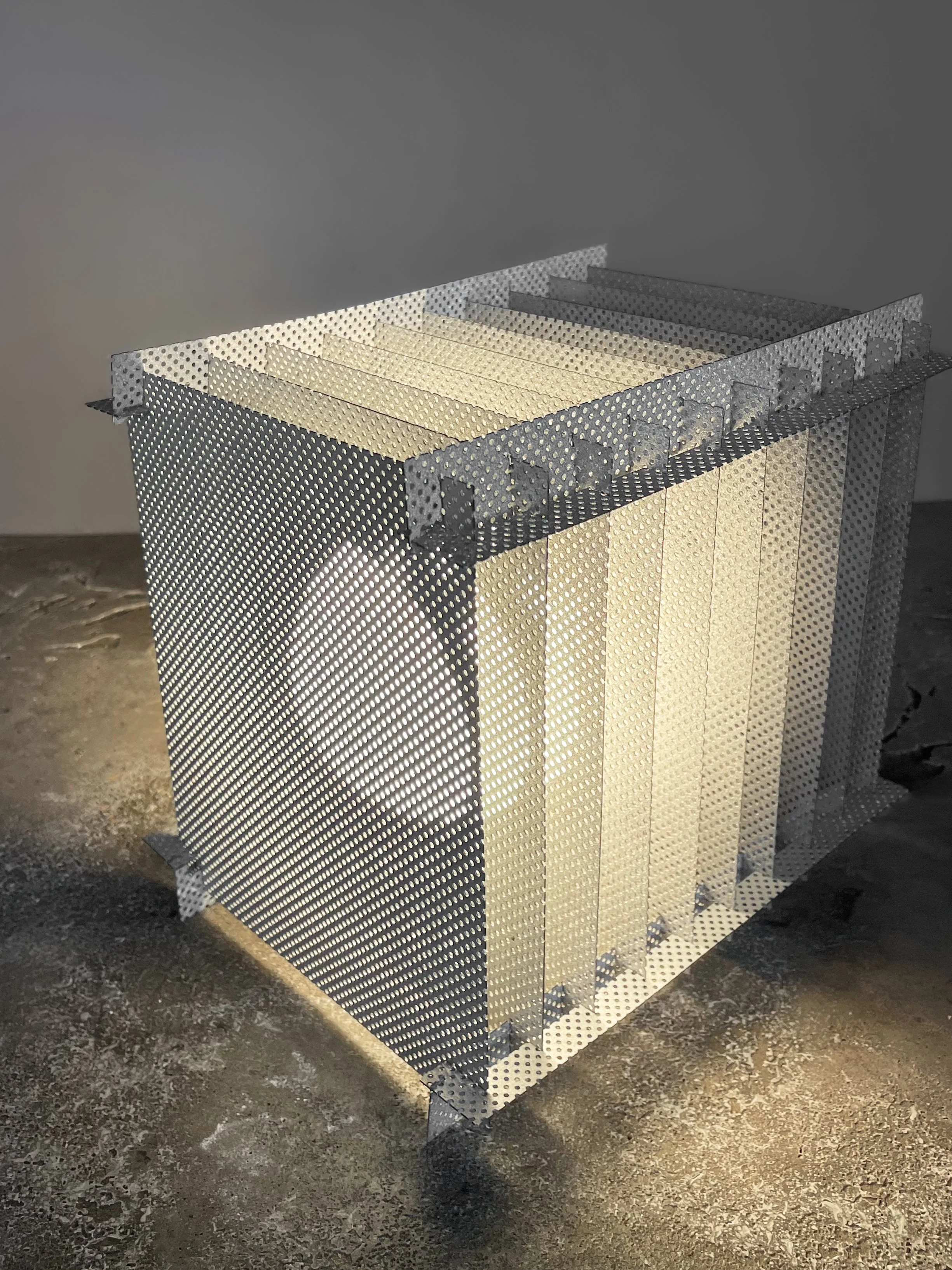 AlaraSipahioglu_OffTheCeilingLayeredLampOnDustAndDusted_ 2025_SteelPanel&SawDustComposite.jpg