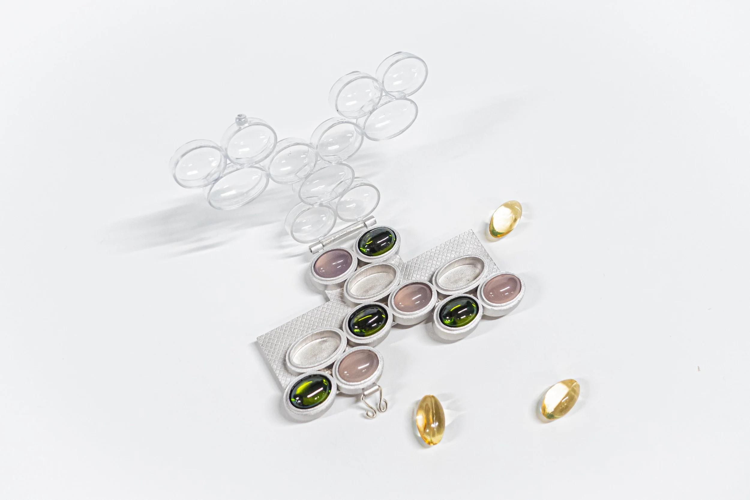 JingyaoLi_JewelleryCoatingI_2024_RhodiumPlatedBrass_Gemstones_Medication_9.22x5.70x2.05cm_£450_02.jpeg