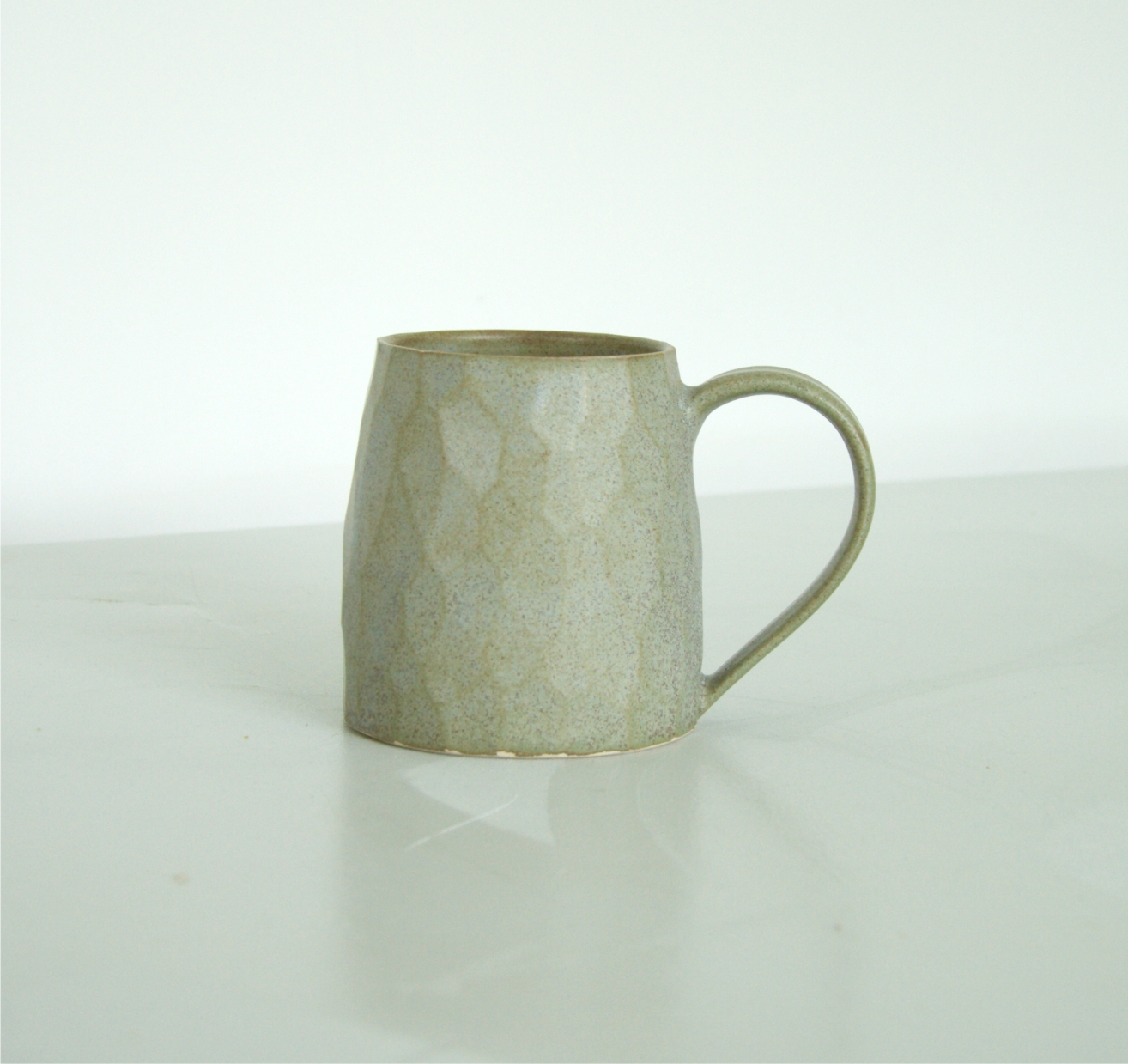 01_Facetted green grey mug 2 small.jpg