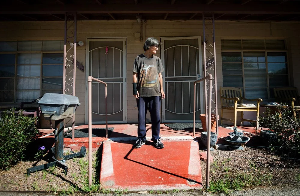  Leigh Ann Baker steps out of her studio apartment at Miracle Square, 2601 N Oracle Rd., on September 26, 2019. Miracle Square helps adults with disabilities and the elderly to live independently.  Mamta Popat / Arizona Daily Star 
