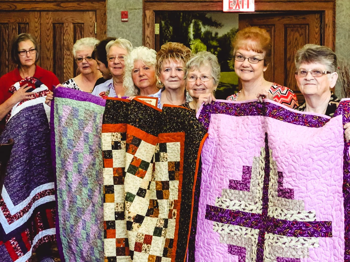 Group+holding+quilts.jpg