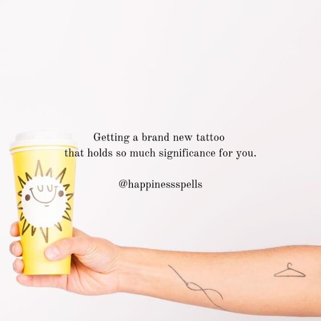 Discover this spell in Episode 72: Lifting You Up, and Holding You Steady. 💖⭐✨ [This image shows an arm that has a cute tattoo of needle and hanger, holding a cup with the words &ldquo;Getting a brand new tattoo that holds so much significance for y