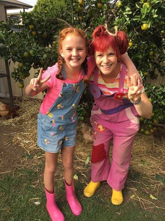 Here is a pic of me and my friend - chicken girl! She really knows a lot about chickens!