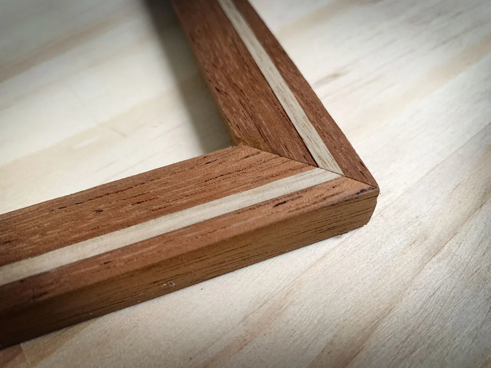Merbau and oak handmade inlaid frame.
