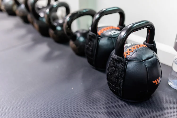 Kettlebells lined up in the gym