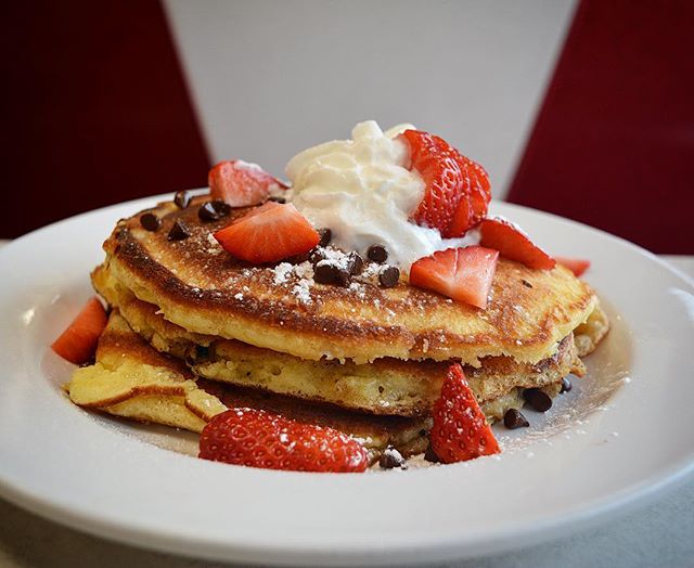BAE doesn&rsquo;t want bacon &amp; eggs? These chocolate chip &amp; strawberry pancakes are perfectly perfect, just like you. Love Day Brunch with us today 7am-2!