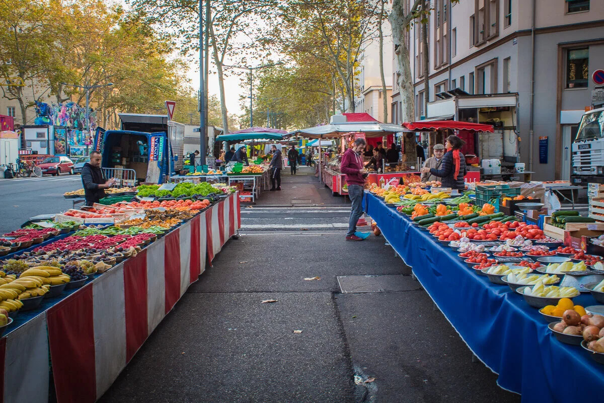 Market on Boulevard de la Croix-Rousse. (Can you see the plates of raspberries on the left? So beautiful.)