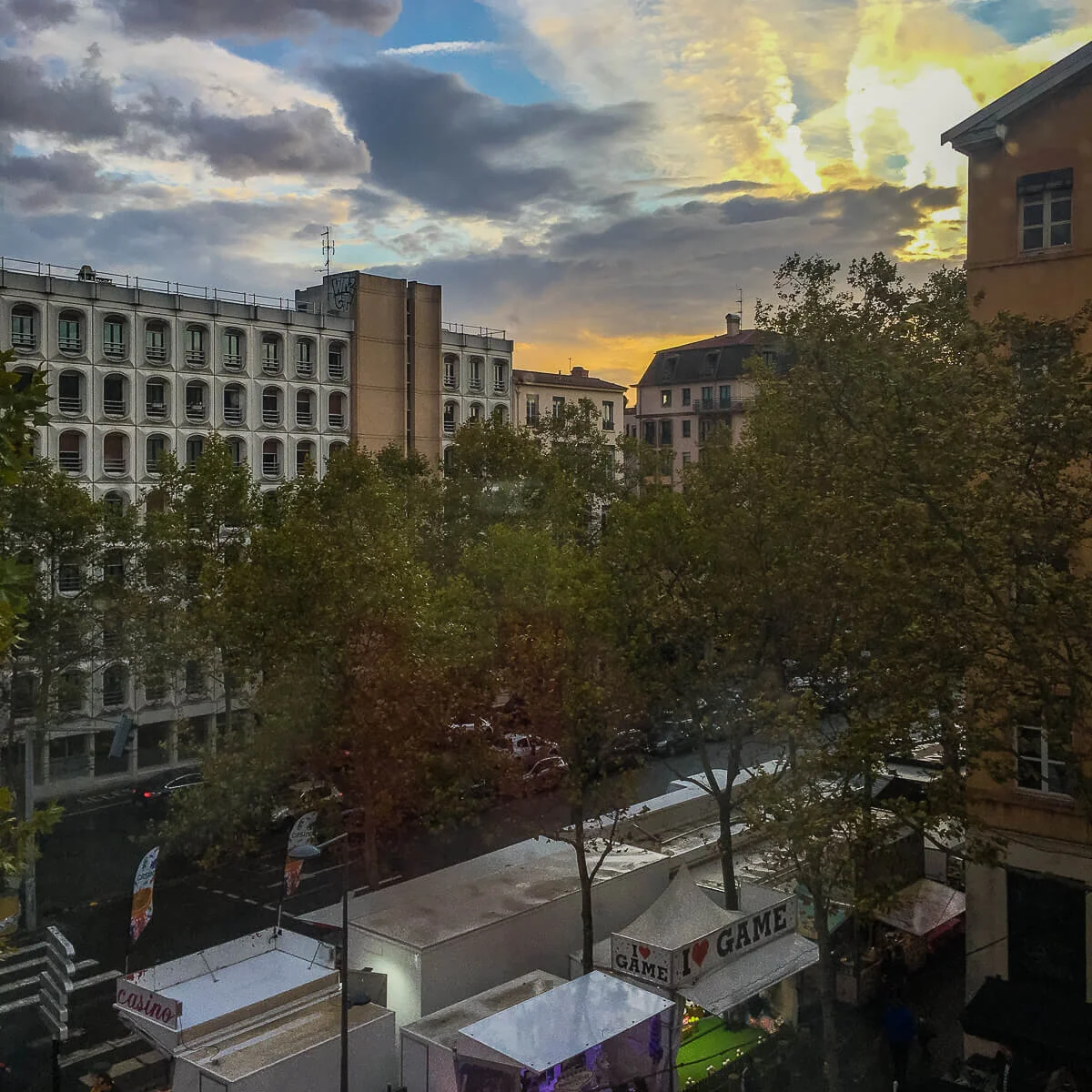 Rainy days can make for pretty sunsets. You can see the carnival below too.