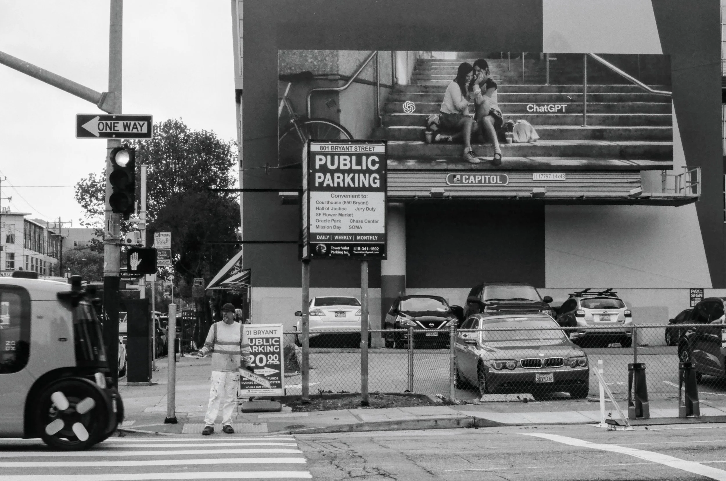 This billboard is special in that it's the only one in SF from OpenAI (as far as I've seen). Other companies tend to put their ads on every billboard, bus shelter, and train station in the city. In this shot I captured the tail end of an autonomous v