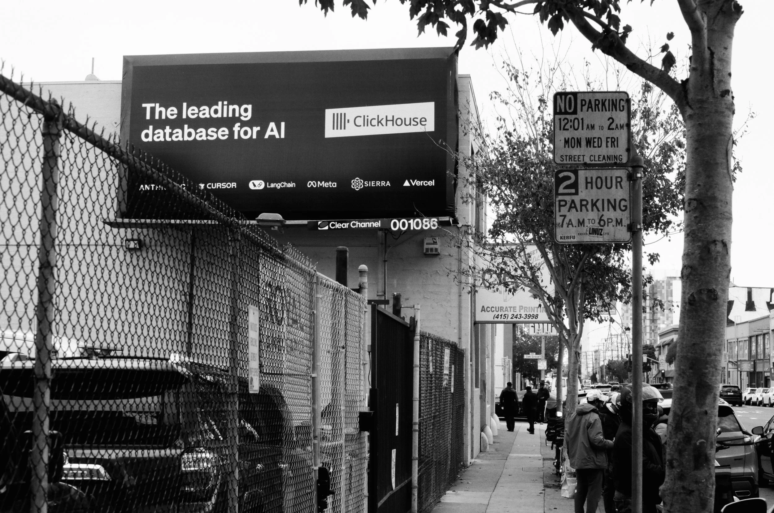 This shot is interesting because it was taken right around the corner from a large ghost kitchen, at noon (lunchtime). The street was teeming with delivery drivers on scooters waiting to pick up orders, like the guys at the bottom right. AI will repl