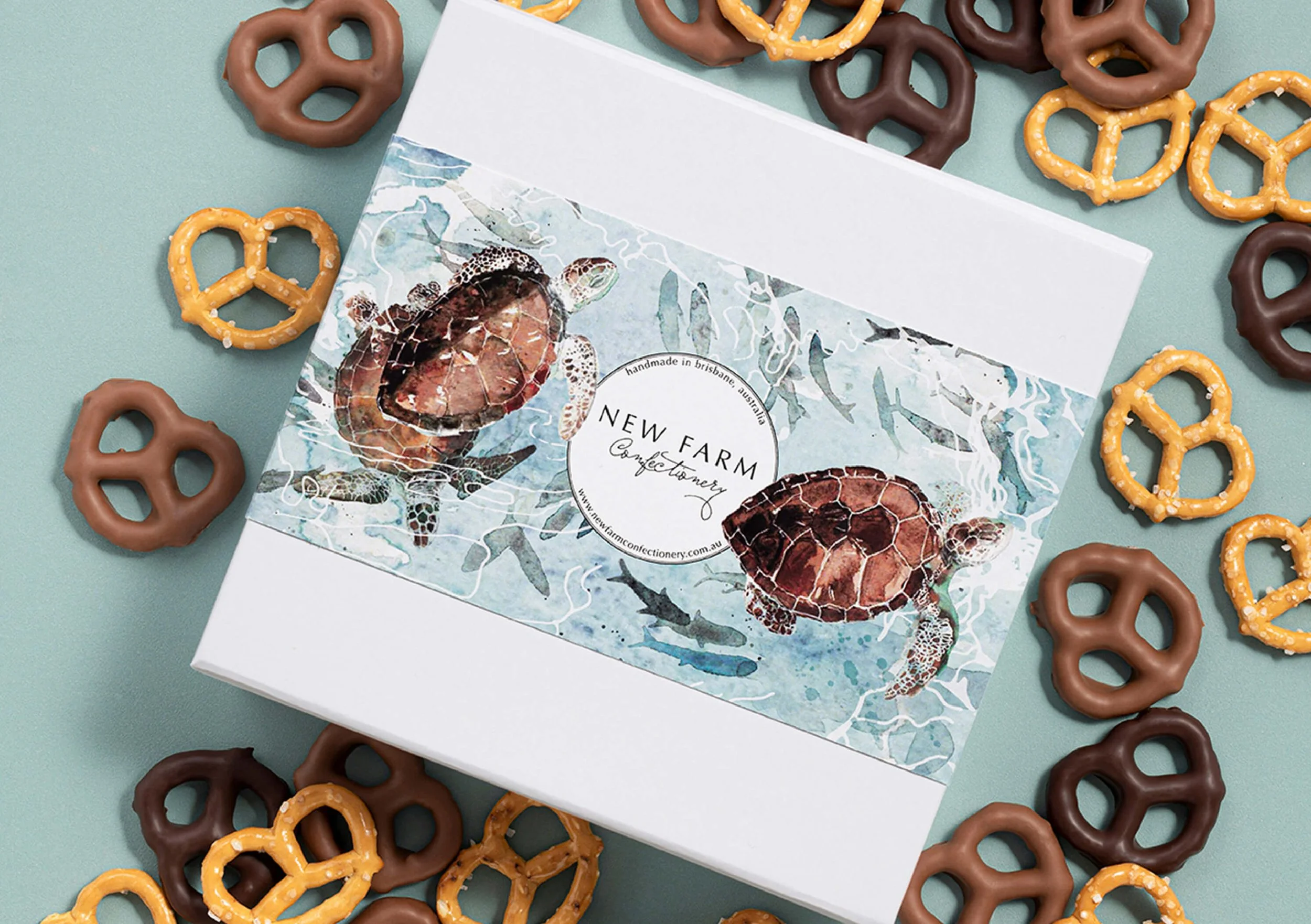 Hand-painted watercolour sea turtle packaging illustration created for New Farm Confectionery Father's Day seasonal gift box campaign.