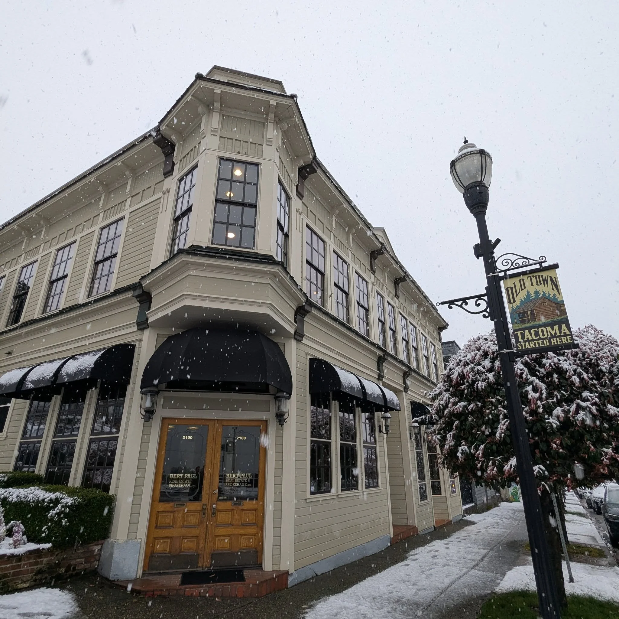 I assure you; we're open!

Our 1890 building does look good in the snow.