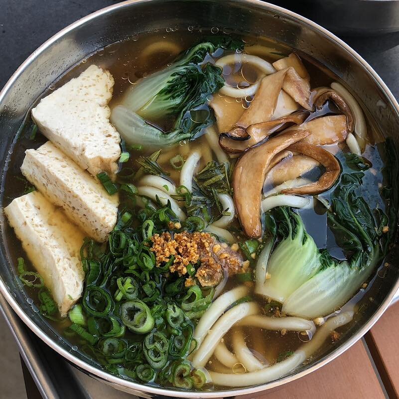 Craving Comforting Fuel? Warm Up with Our Classic Forest Udon! Smoked trumpet mushrooms, roasted tofu &amp; bok choy in a heart-warming vegan broth. Detroit-style Comfort Food! ✨ #ImaNoodles