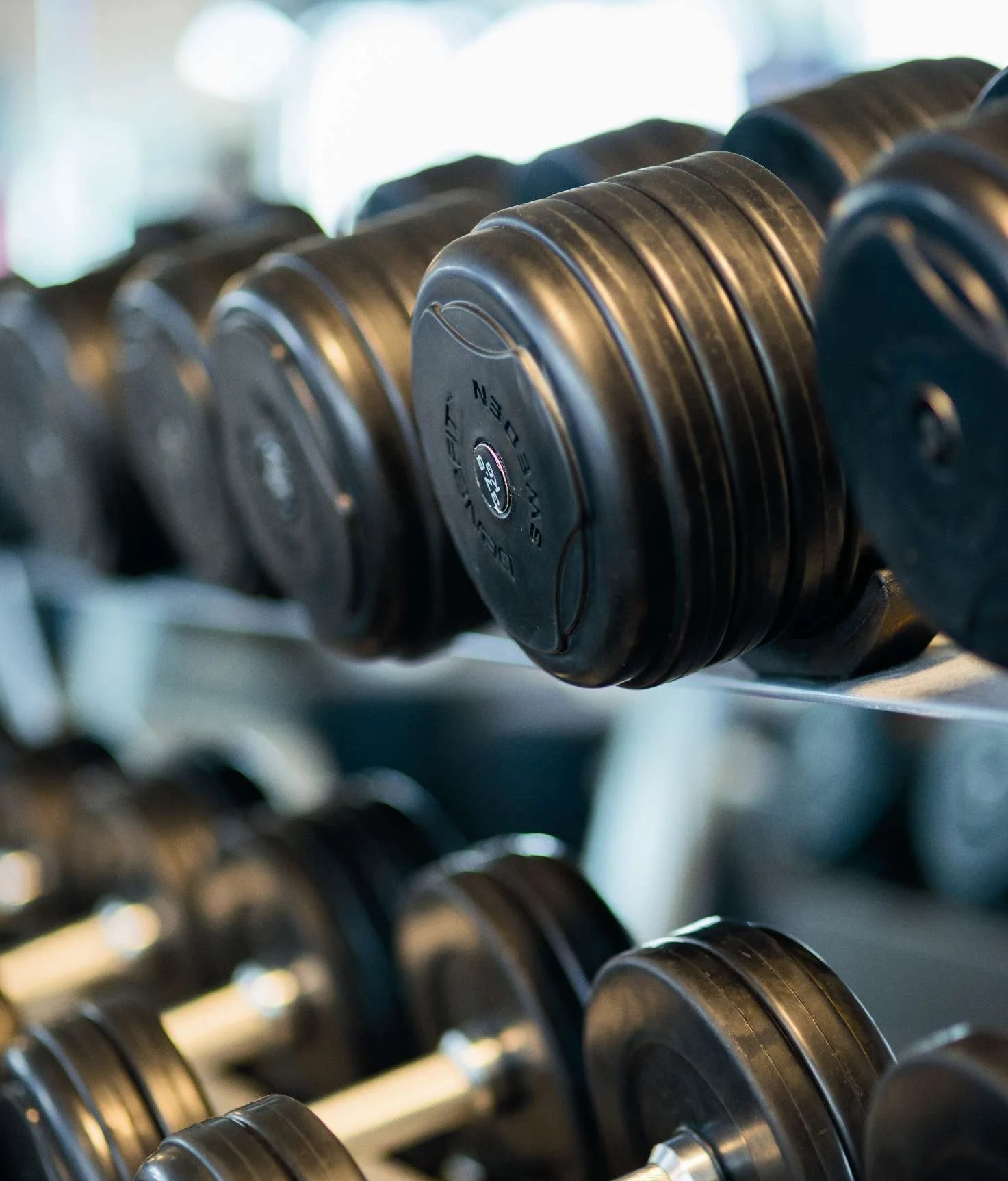 bodybuilding-close-up-dumbbells-260352.jpg