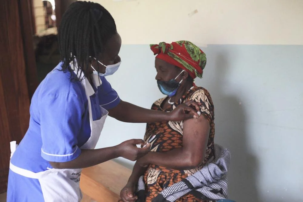 In Uganda, remote islands test delivery of COVID-19 vaccines