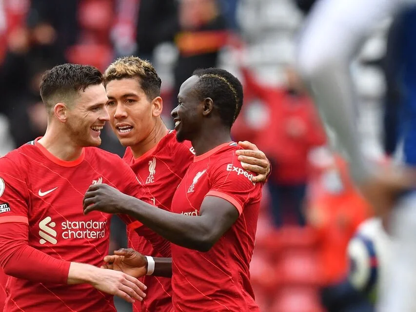 Mane's brace fires Liverpool into Champions League