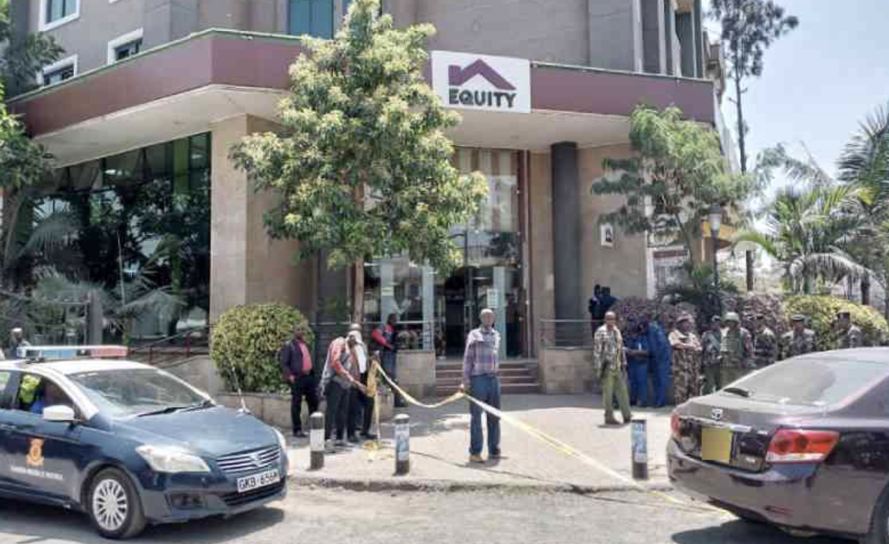 Knife-wielding man shot in suspected bank robbery