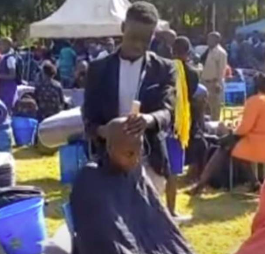 Kenyan school shaves off female students' long hair