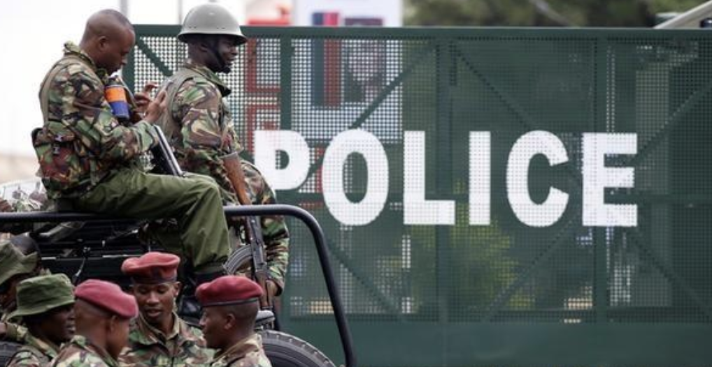 Kenyan police officers found trafficking 13 foreigners