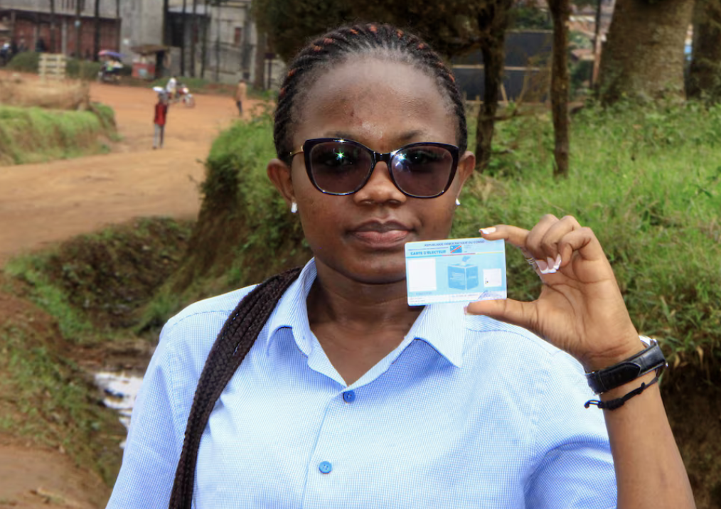 Smudged ID cards, missing names blemish Congo's $1 billion election