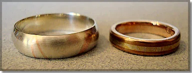 Pair of Wedding Rings made in White and Red Gold, and Mokume Gane