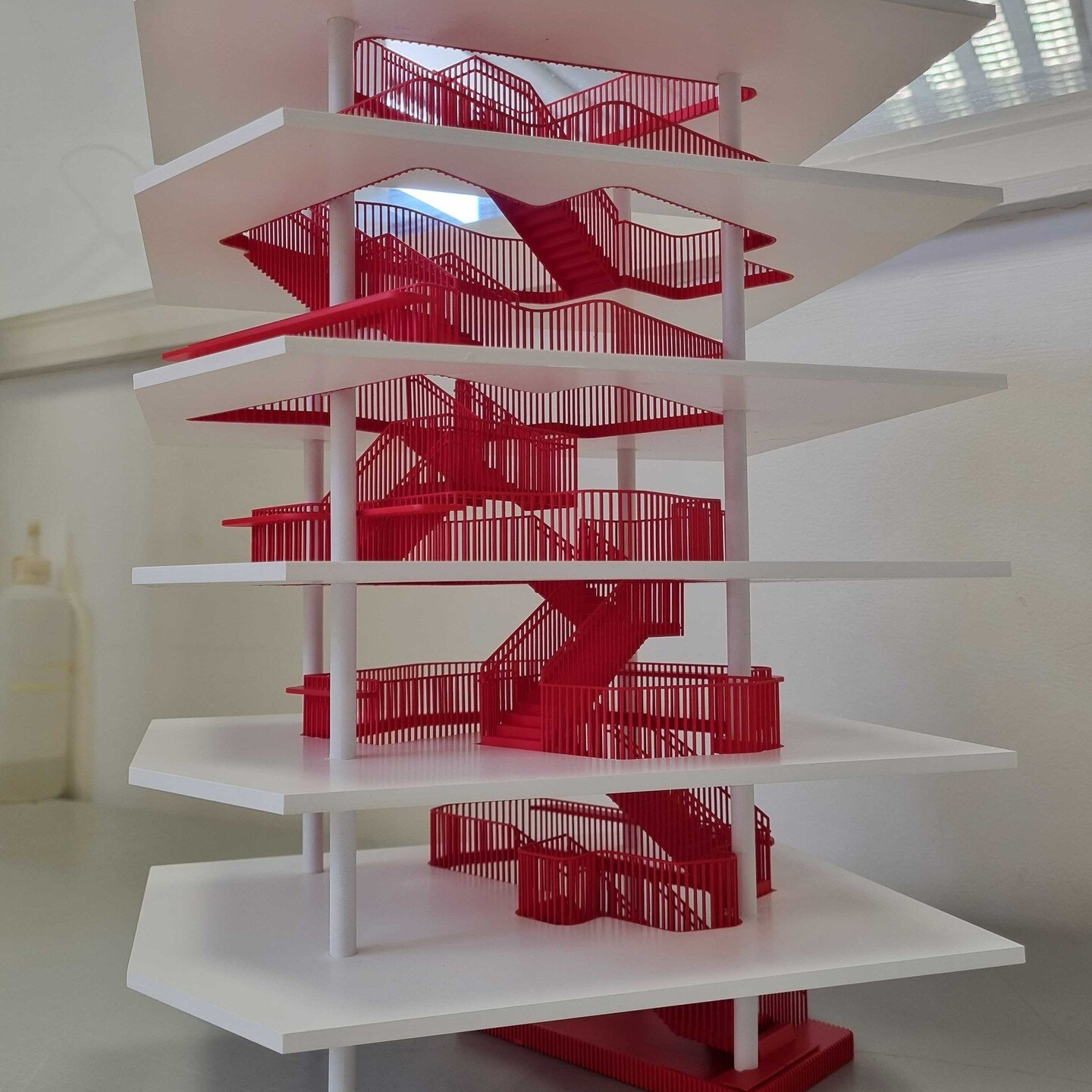 A physical model always works well to explain a concept to a client. Here is another good example for #3dprinting and #modelmaking combined. #stereolithography #3dprinted stairs sprayed red with white laser-cut floor plates and acrylic rod floor divi