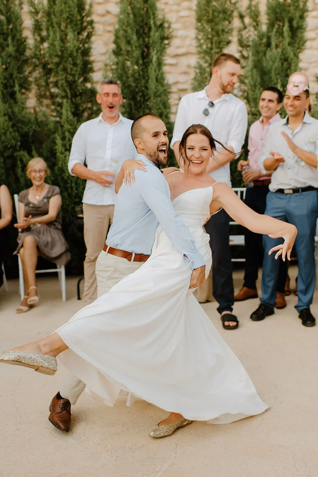 Bride and groom during their outdoor wedding ceremony in Spain, destination wedding photography by Sara Monika