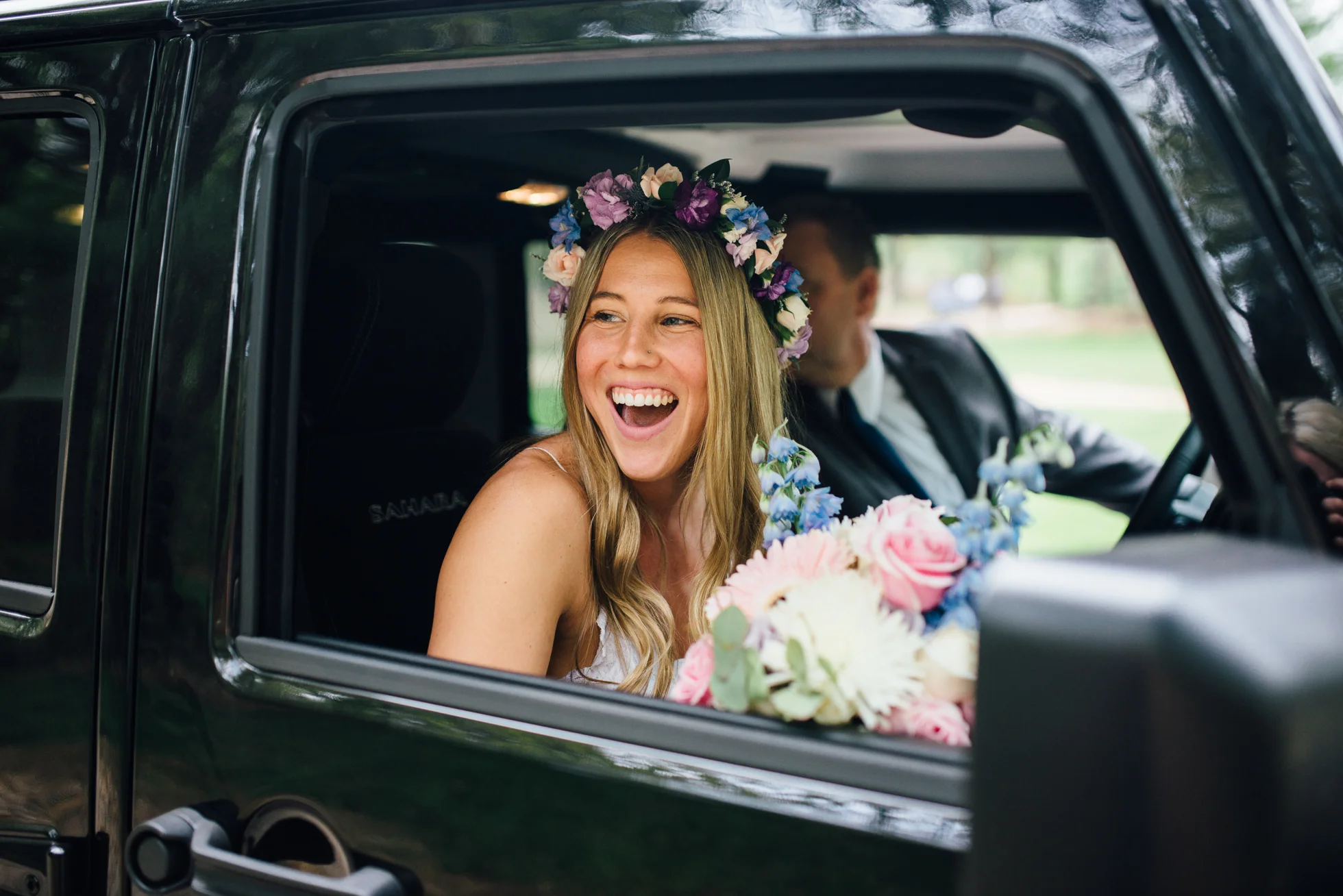 Fernwood Hills London Ontario Bohemian Wedding - Bride arriving in a Jeep