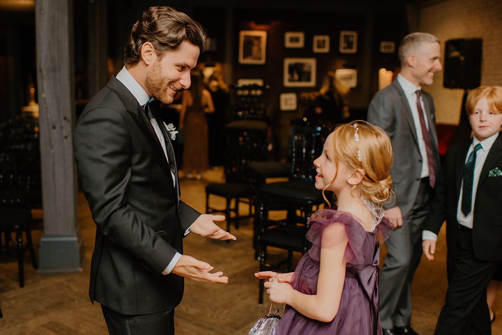 STORYS Building Wedding in Toronto Robyn and Tyler – Groom Chatting with Wedding Guests