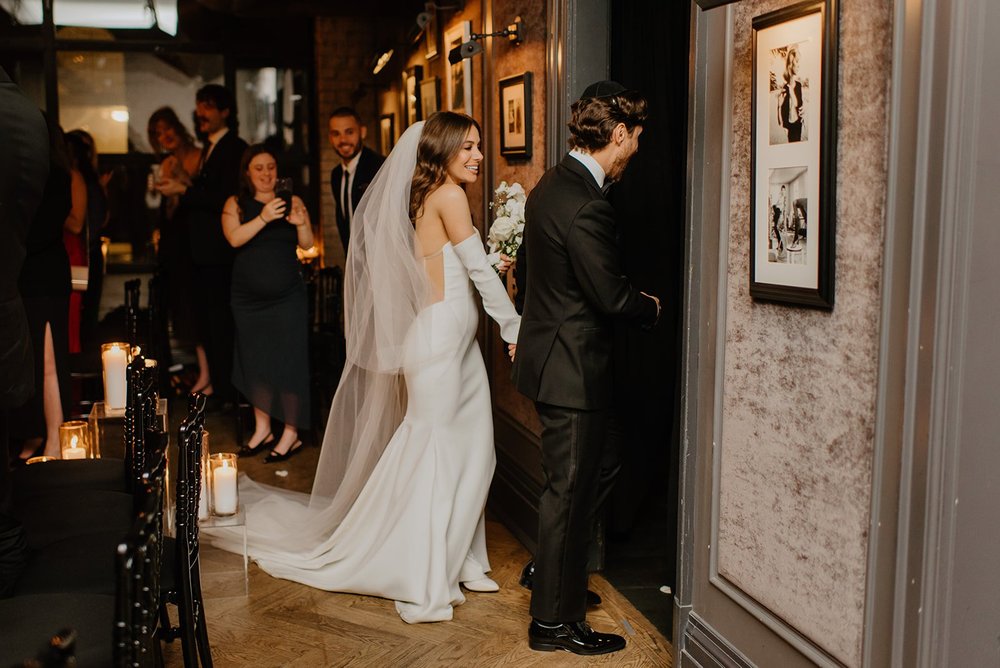 STORYS Building Wedding in Toronto Robyn and Tyler – Couple about to enter Private room for their Vows