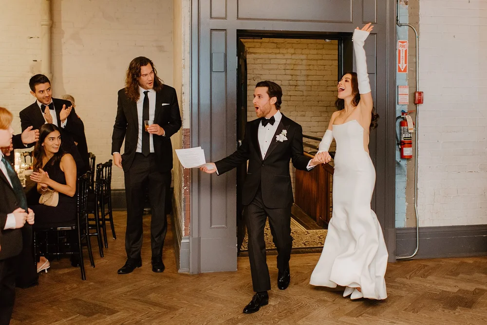 STORYS Building Wedding in Toronto Robyn and Tyler – Bride and groom making their grand entrance into the reception