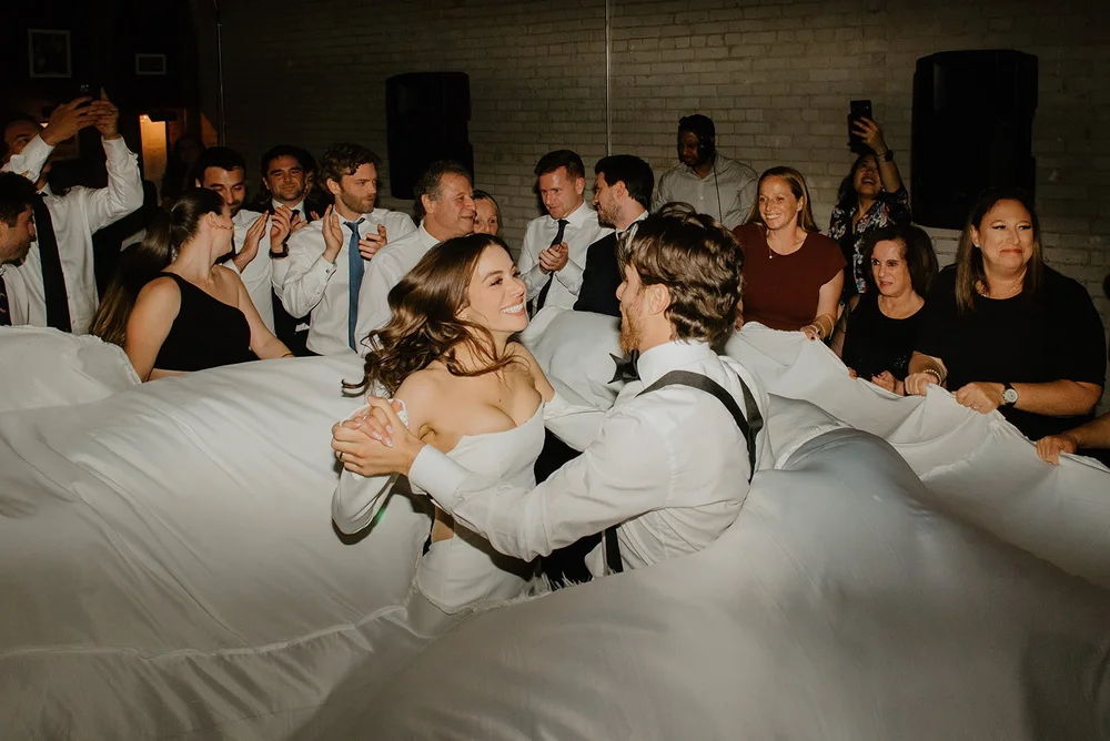 STORYS Building Wedding in Toronto Robyn and Tyler – Bride and Groom Dancing the Hora