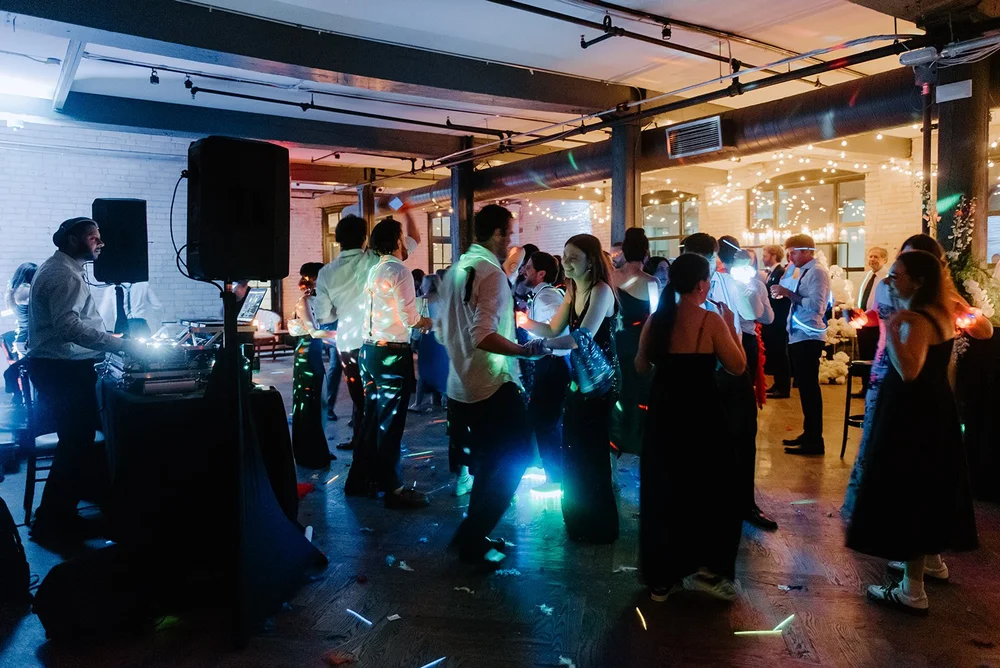 STORYS Building Wedding in Toronto Robyn and Tyler – Inside the Rave Party with Bright Lights
