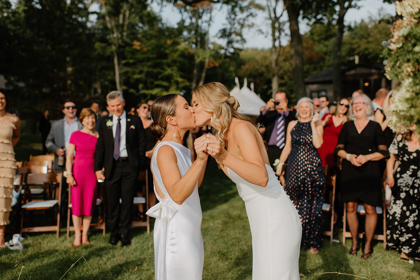 Family Home Kingston Wedding of Vanessa and Liz – romantic moment as the two brides share a kiss after the ceremony