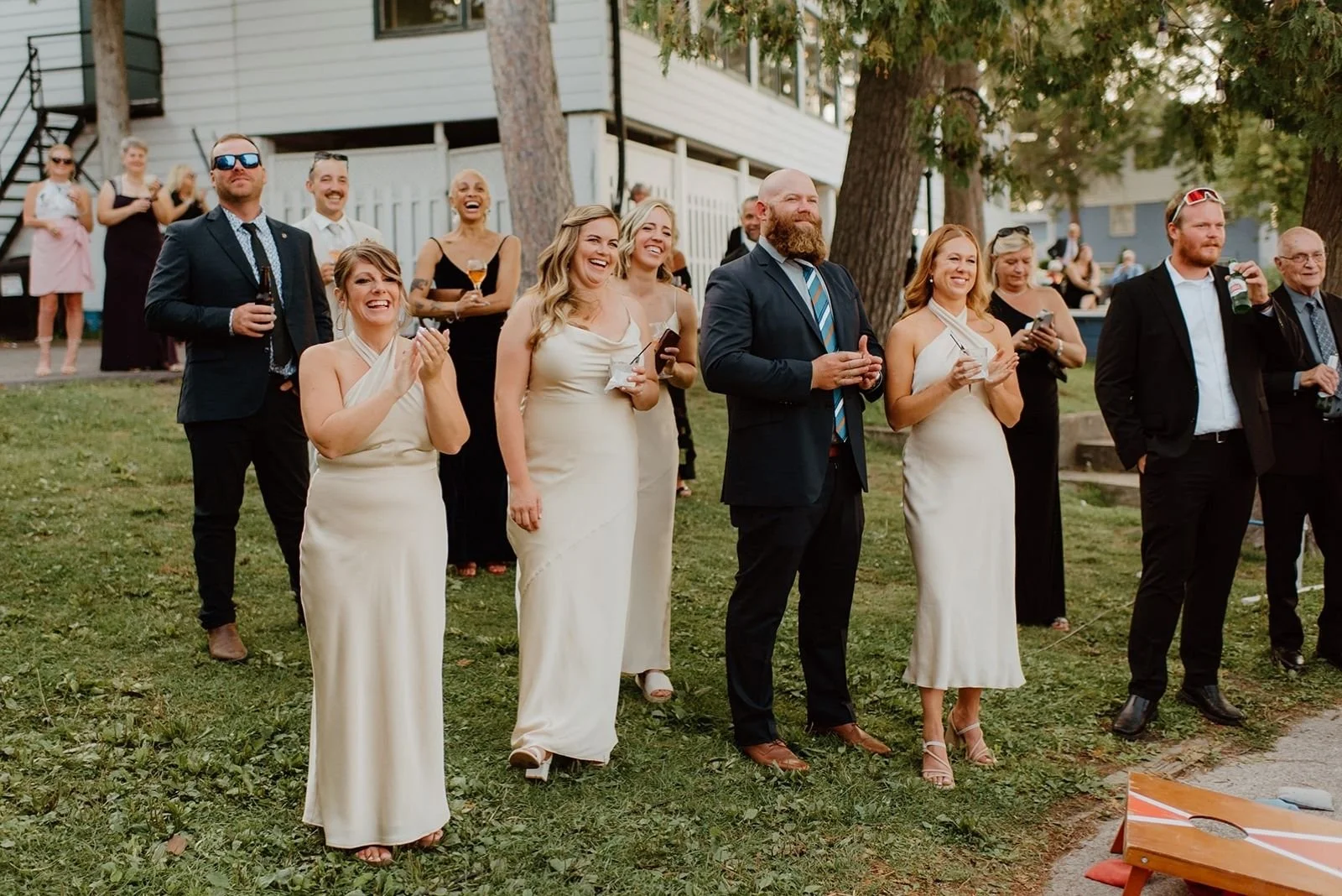 Joyful Bayview Wildwood Wedding – Guests gather around the couple during their first dance.
