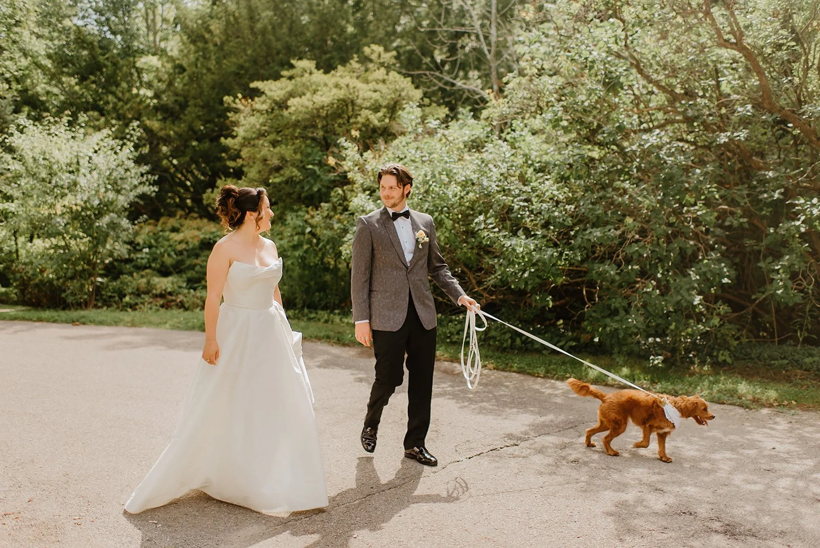 Eaton Hall Wedding in King City | Benita + Allen – Couple posing for portraits with their dog at the historic Eaton Hall.