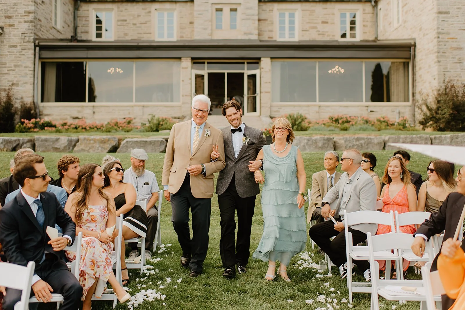 Eaton Hall Wedding in King City | Benita + Allen – Allen a walk down the aisle with his father and mother.