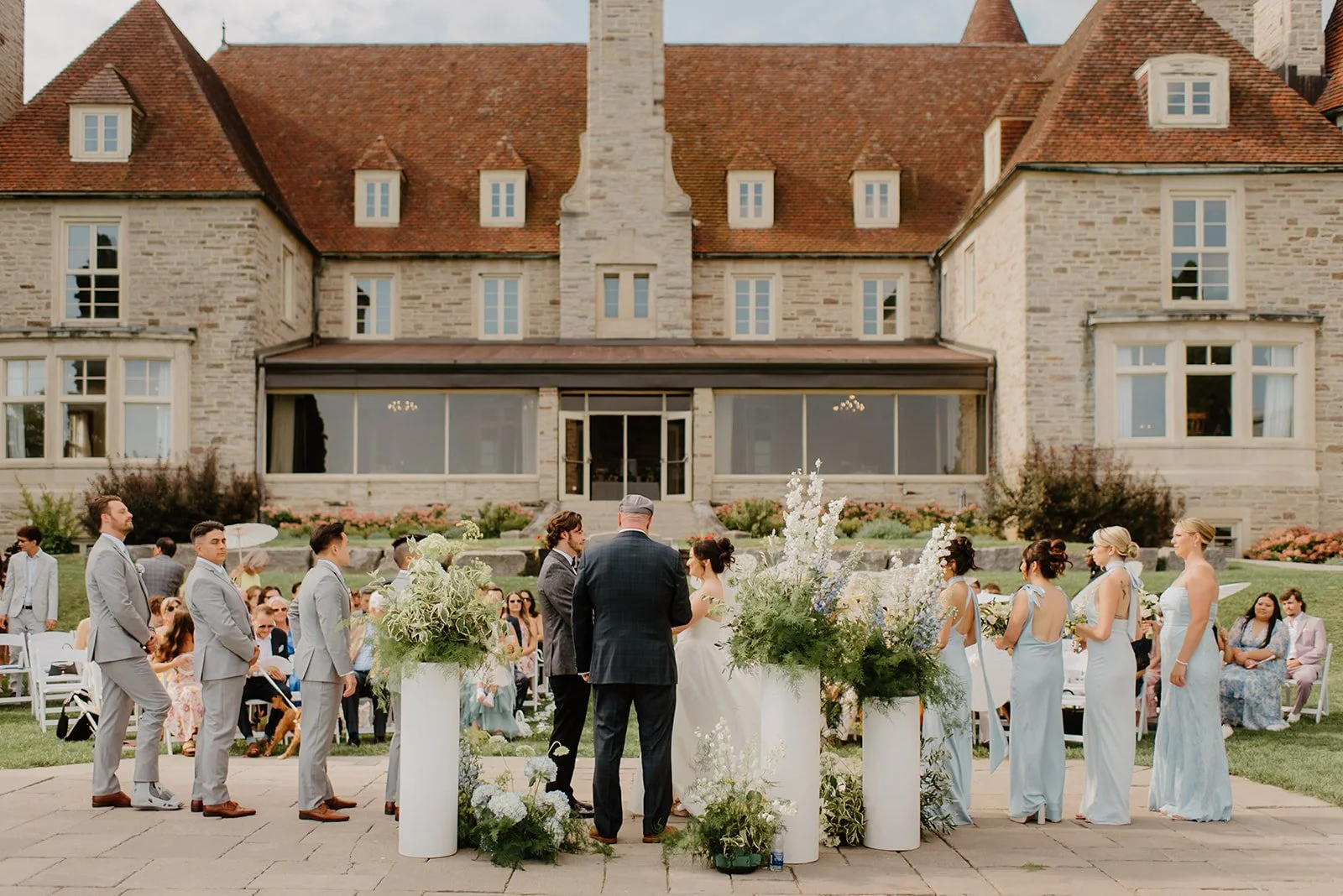 Eaton Hall Wedding in King City | Benita + Allen – Candid shot of Benita and Allen looking at each other during the ceremony.
