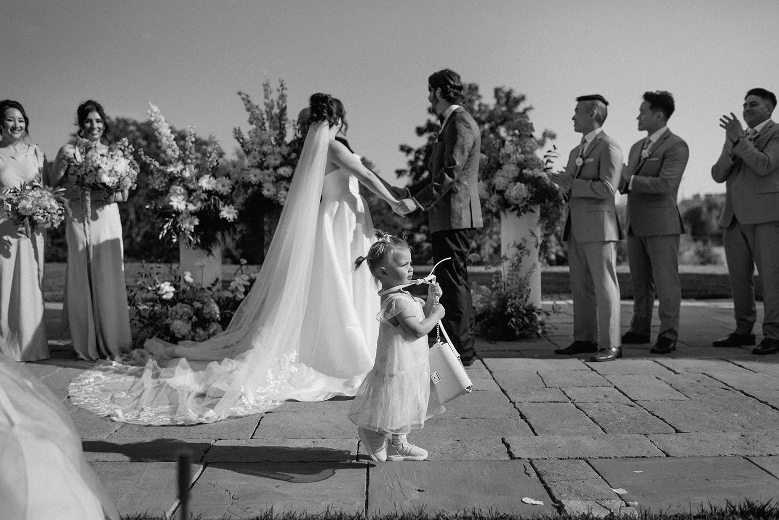 Eaton Hall Wedding in King City | Benita + Allen – Candid shot of Benita and Allen looking at each other during the ceremony.