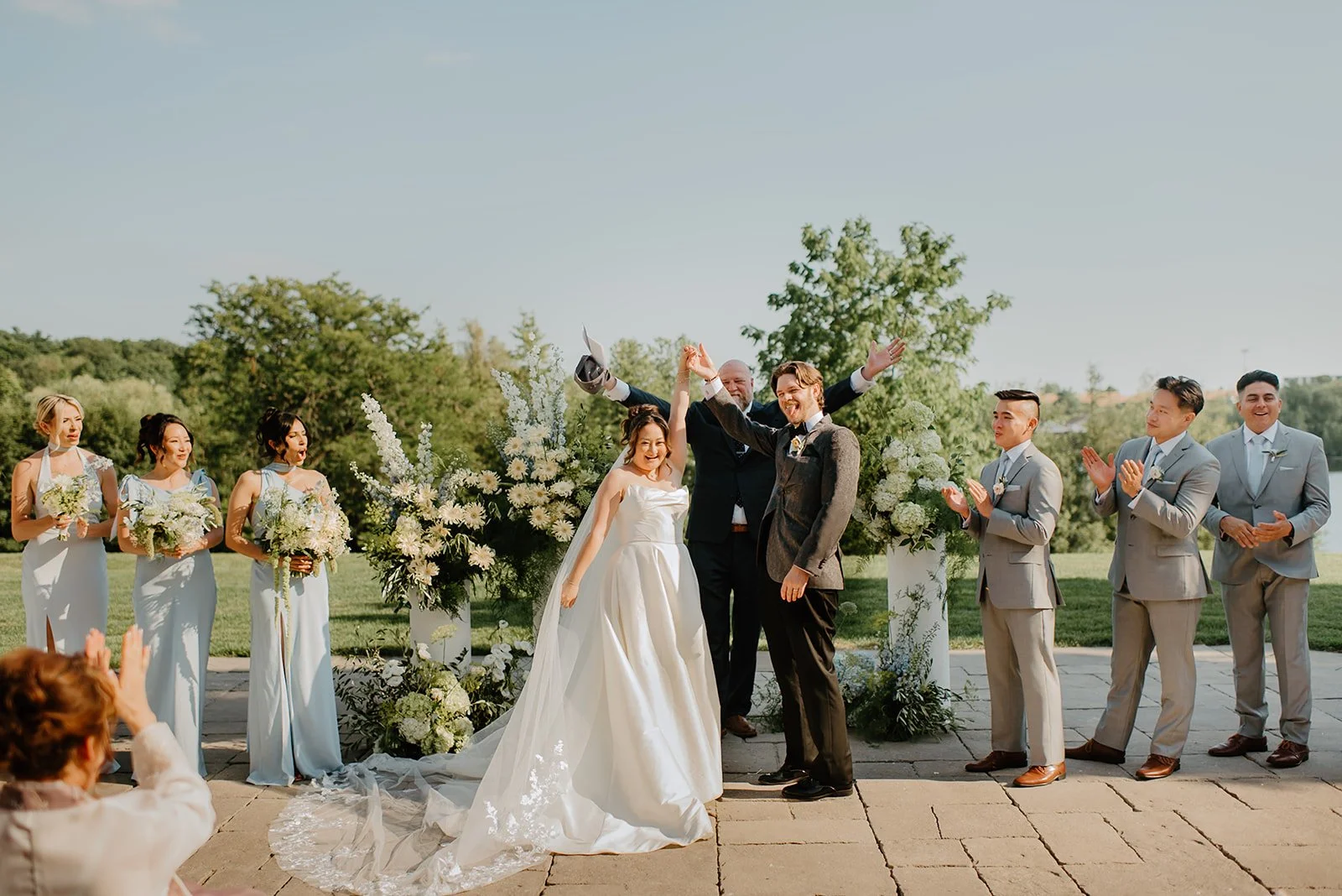 Eaton Hall Wedding in King City | Benita + Allen – Candid shot of Benita and Allen celebrating immediately after the ceremony.
