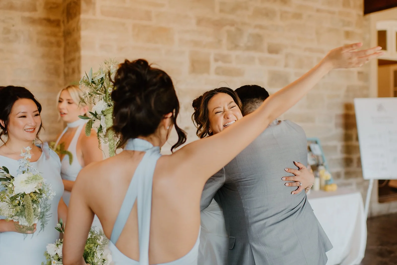 Eaton Hall Wedding in King City | Benita + Allen – Candid shot of Benita and Allen celebrating immediately after the ceremony.