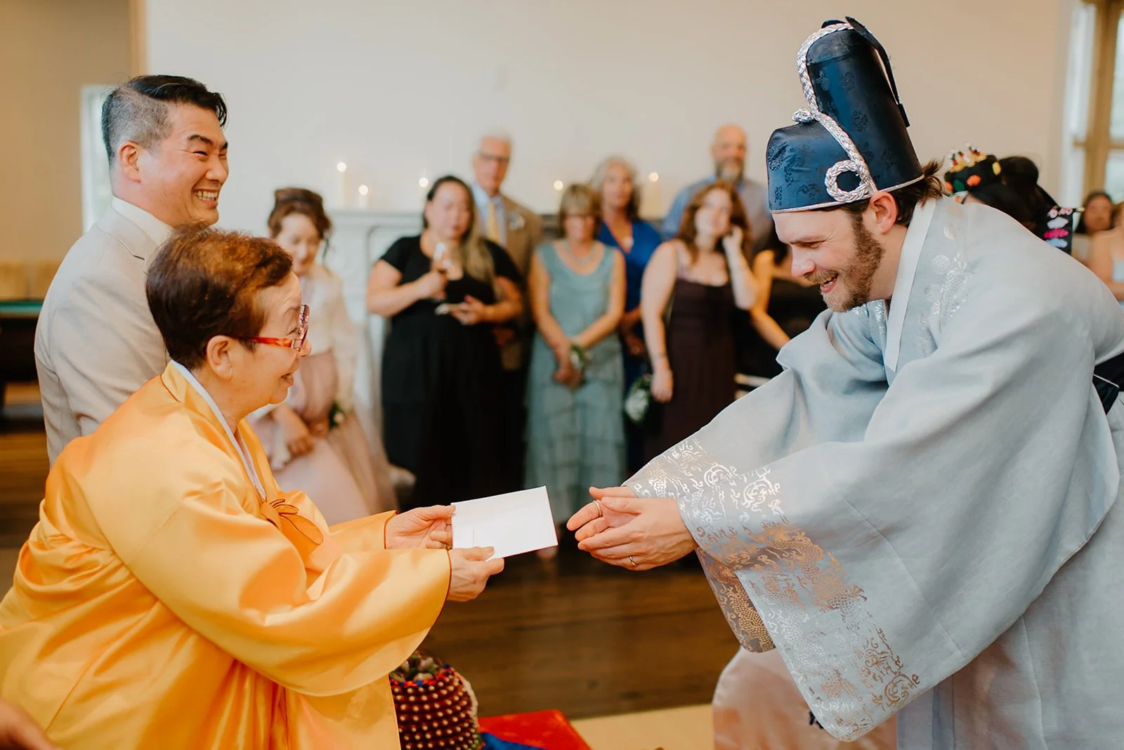 Eaton Hall Wedding in King City | Benita + Allen – Parents of the bride and groom participating in the Korean tea ceremony.