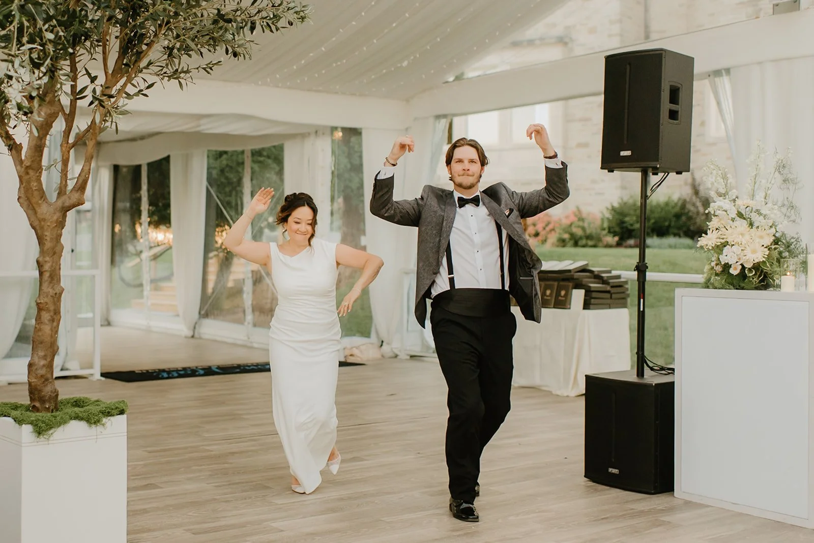 Eaton Hall Wedding in King City | Benita + Allen – Benita and Allen entering their reception to loud applause.