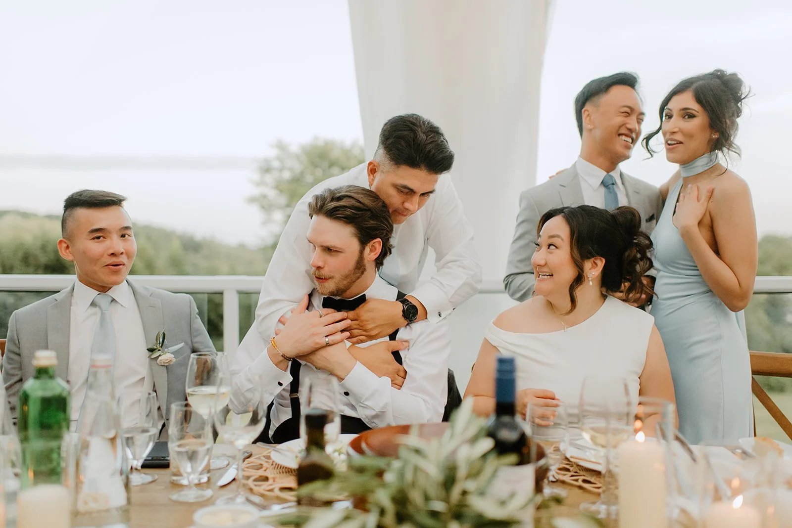 Eaton Hall Wedding in King City | Benita + Allen – Groomsmen wearing matching blue suits with citrus-colored boutonnieres.