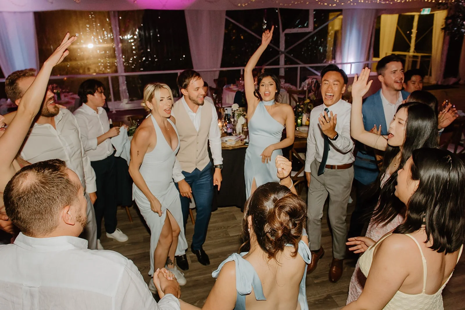 Eaton Hall Wedding in King City | Benita + Allen – High-energy dance floor with guests jumping to the music.
