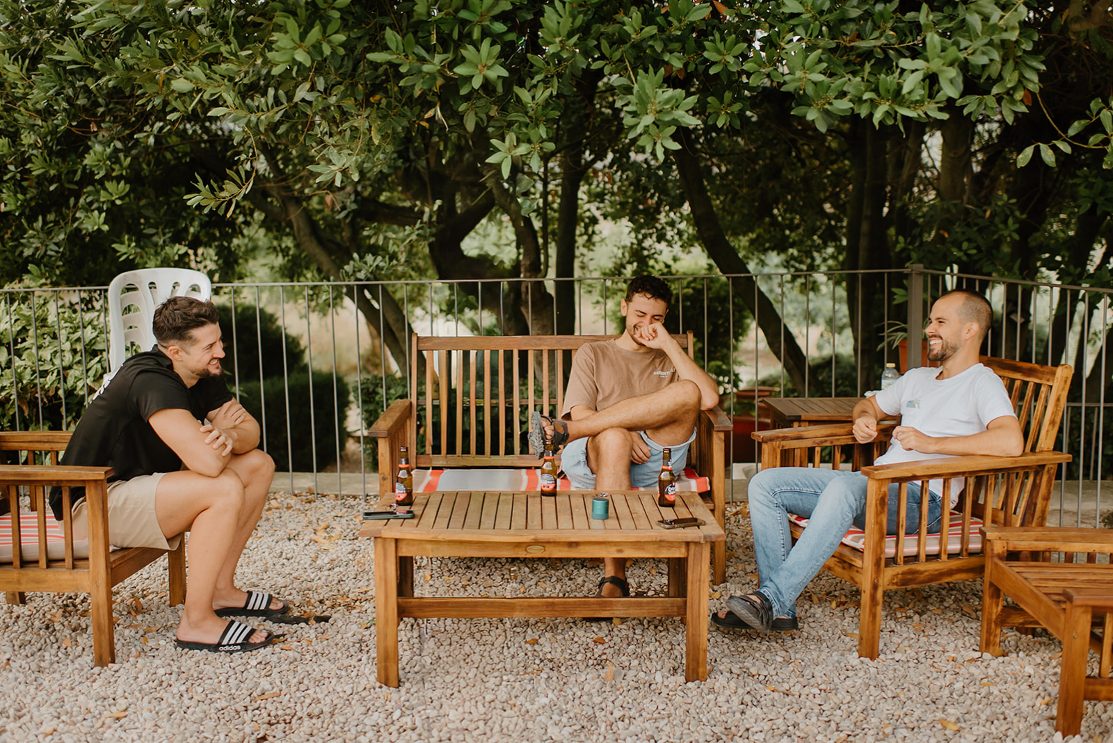 Castell de Barxell Wedding | A Romantic Spanish Countryside Celebration with Zuzanna + Raul – Raul laughing with his groomsmen during the morning preparations.