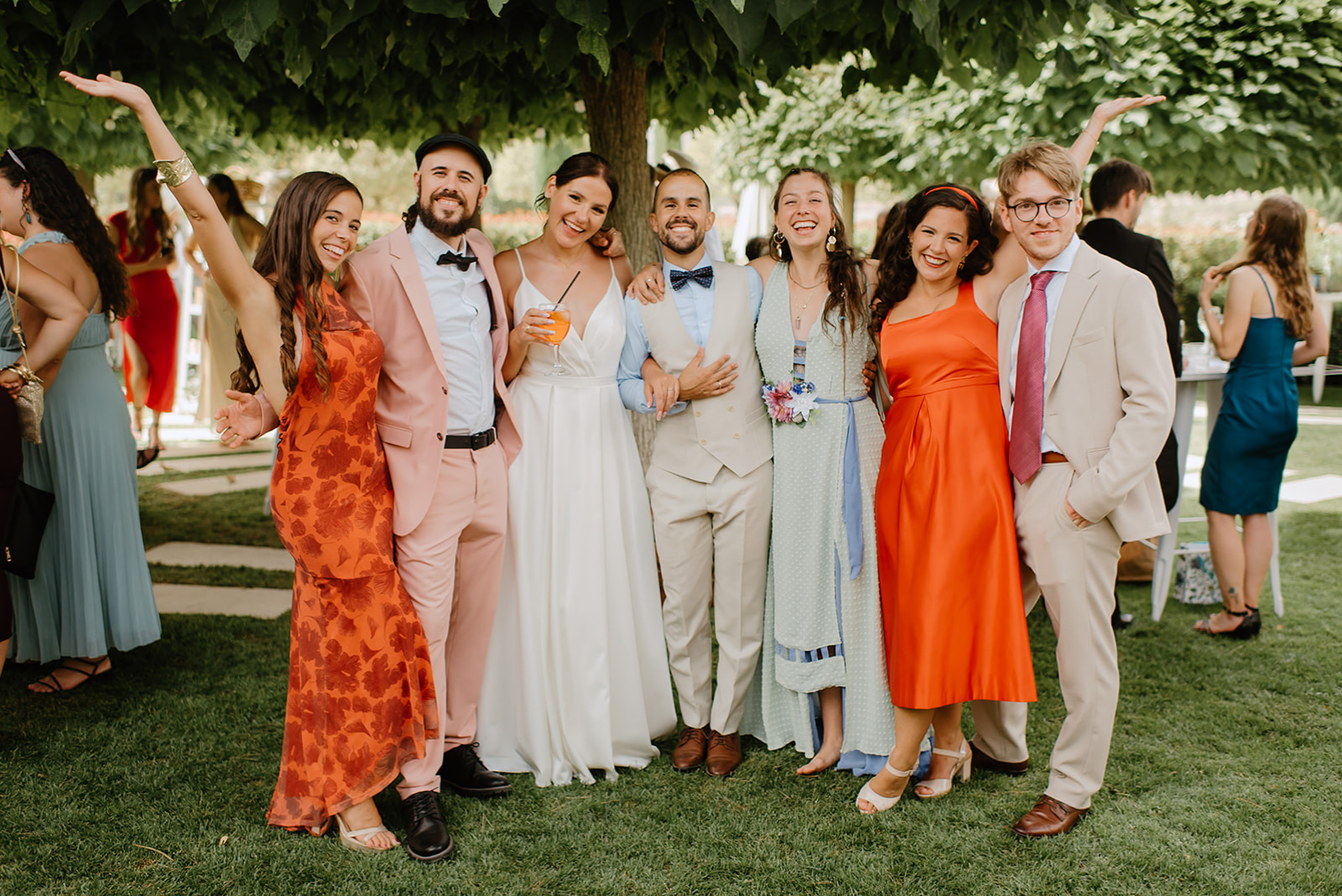 Castell de Barxell Wedding | A Romantic Spanish Countryside Celebration with Zuzanna + Raul – Guests mingling in the sun-drenched courtyard of Castell de Barxell.