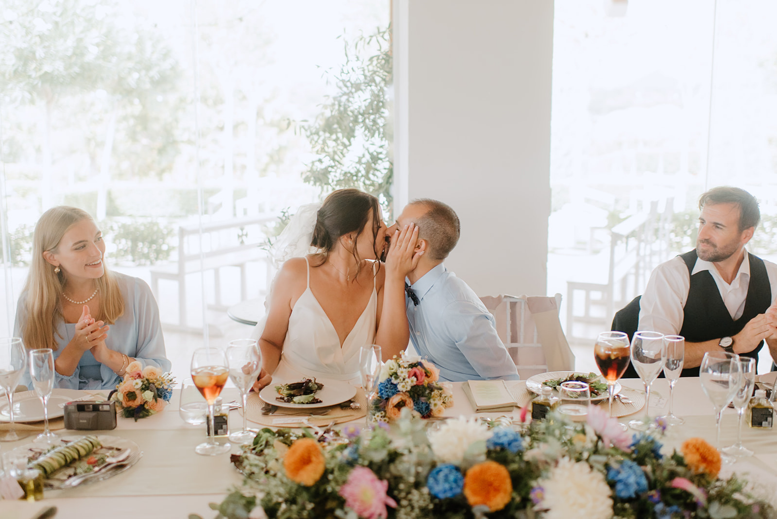 Castell de Barxell Wedding | A Romantic Spanish Countryside Celebration with Zuzanna + Raul – A candid moment of the couple kissing.