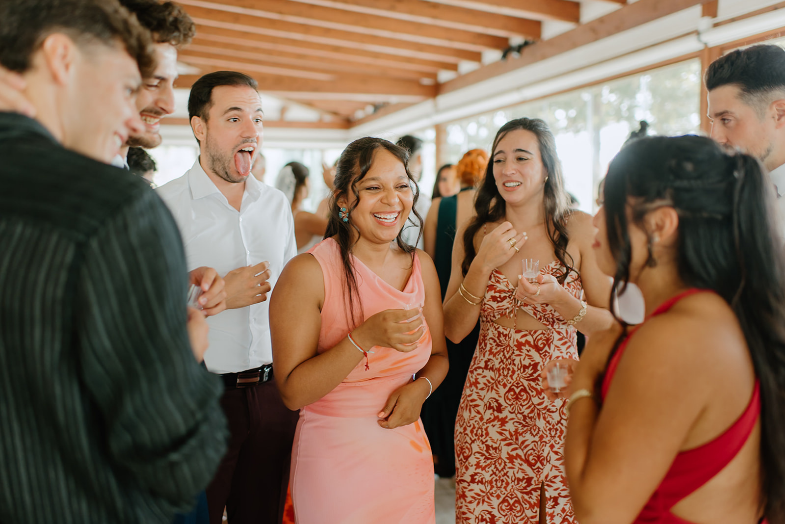 Castell de Barxell Wedding | A Romantic Spanish Countryside Celebration with Zuzanna + Raul – Guests mingling in the sun-drenched courtyard of Castell de Barxell.