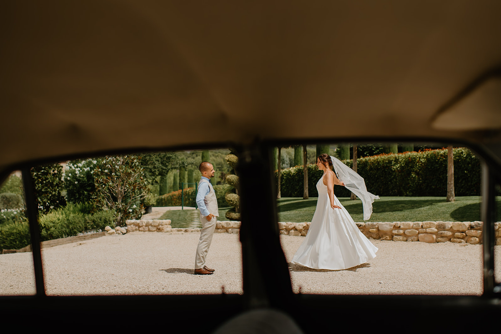 Castell de Barxell Wedding | A Romantic Spanish Countryside Celebration with Zuzanna + Raul – Reflections of the castle in the couple’s vintage car windows.